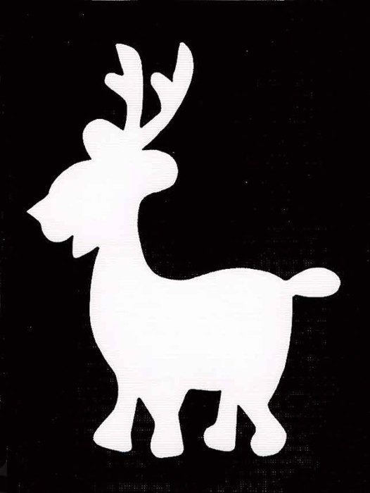Трафарет новорічного оленя з паперу - прикраси на вікна до Нового року своїми руками